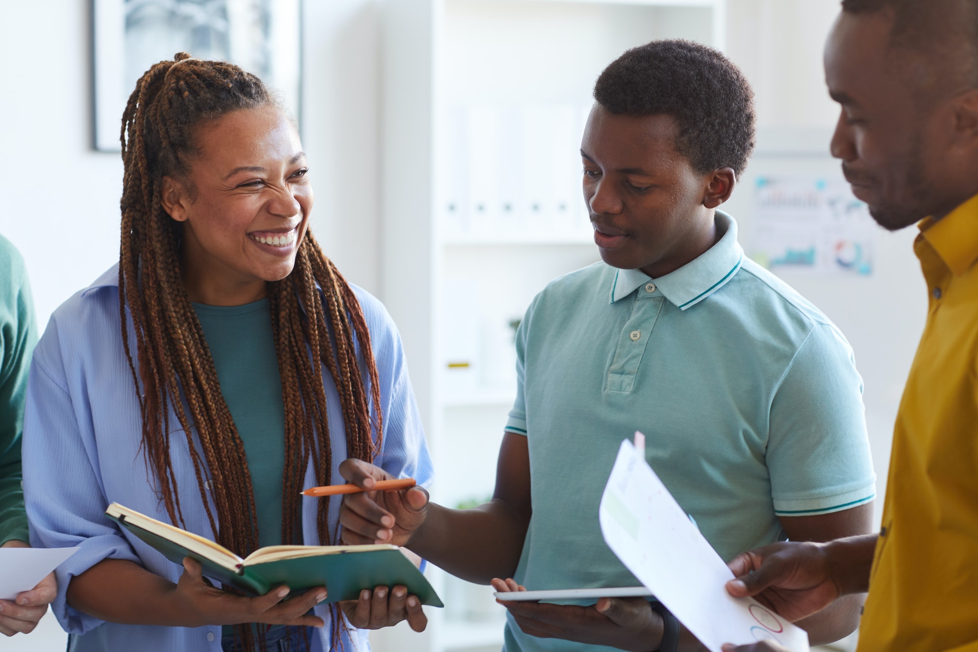 Cheerful African-American Team in Office